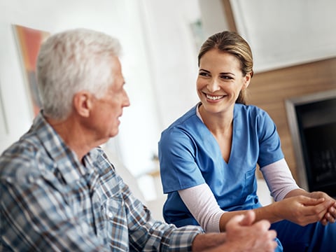 female-nurse-with-senior-man-mb
