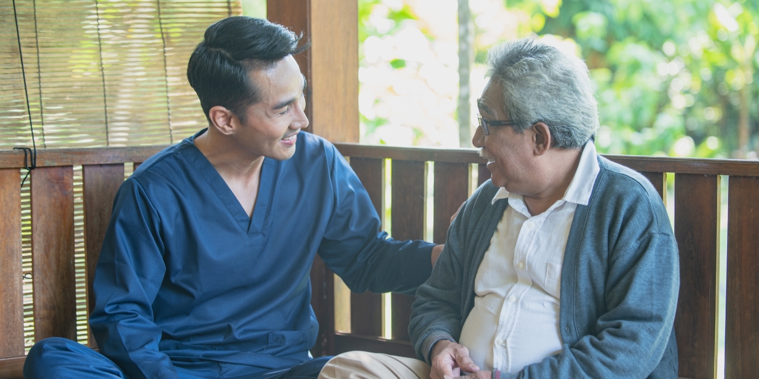 A home health caregiver with senior patient